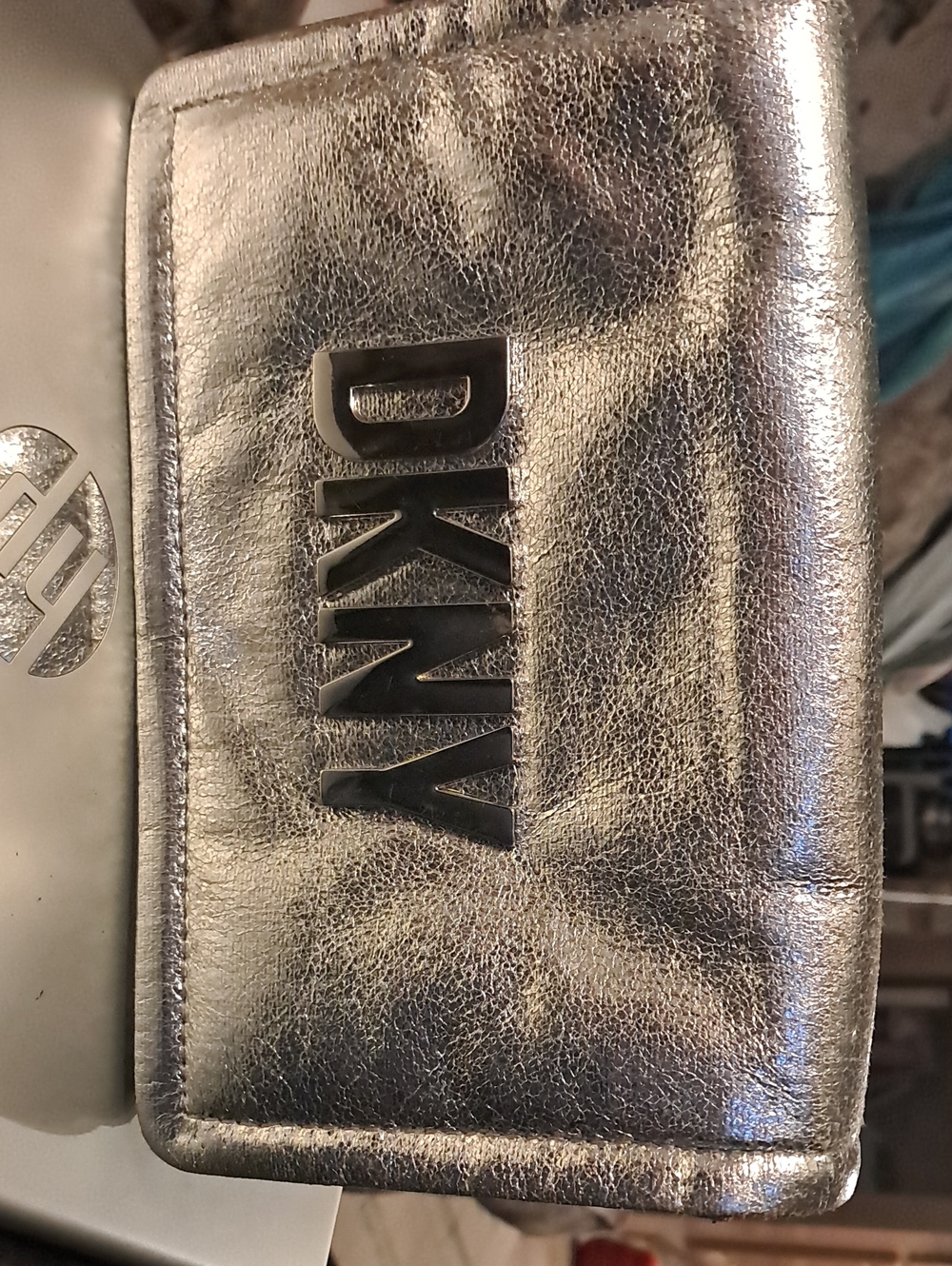 DKNY Metallic Silver Logo Wristlet Clutch